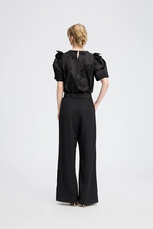 Munthe  ryme top black side