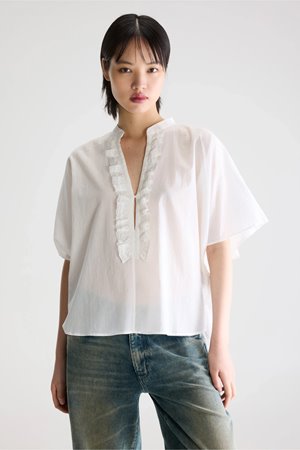 Bellerose dahlia ruffled blouse white