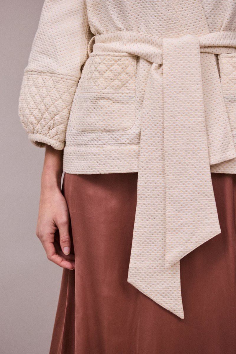 Faune deia jacket side